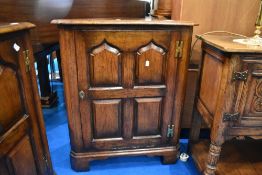 A pair of Titchmarsh and Goodwin oak corner cabinet bases, approx W 70, H 84cm.