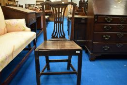 A Georgian oak solid seat dining chair