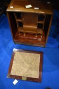 An Edwardian mahogany and inlaid table top desk having drop flap (hinges removed)
