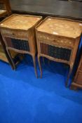 A pair of reproduction Louis XIV style bedside tables with frieze drawer and faux book fronted