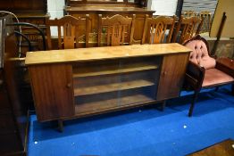 A vintage sapele low bookcase with cupboards to each end, width approx. 156cm