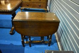 An early 20th Century oak twist gateleg dining table, open dimensions approx. 106 x 78