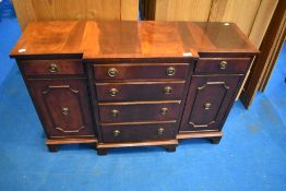 A Reprodux Regency style mahogany dwarf breakfront sideboard, dimensions approx W105 D34 H68cm