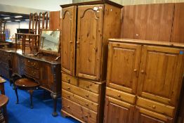 A modern pine tallboy cupboard on chest , dimensions approx. H192cm W88cm D45cm and a similar