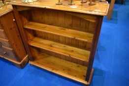 A yellow pine bookshelf, approx. dimensions H100 W96 D27cm