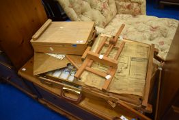 A selection of artists materials including small easels , brush box and pastels etc
