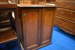 An early 20th century mahogany side cabinet, having fitted interior, W 61, D 34, H 76cm.