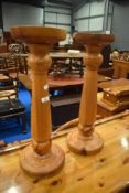 A pair of natural pine torcheres H58cm