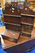 A 19th Century pipe rack and a similar shelf