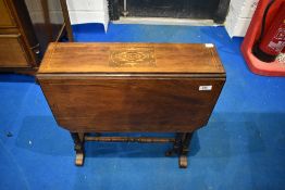 A Victorian mahogany Sutherland table having inlaid top turned legs