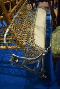 A vintage metal framed cot (decorative use only)