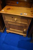 A natural pine bedside cabinet, approx. H59 W46 D38cm