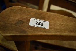 A set of six rush seated chapel chairs having ladder backs, with hymn/prayer book shelves