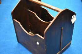 A vintage oak paper rack, dimensions approx. W36 D31 H40cm