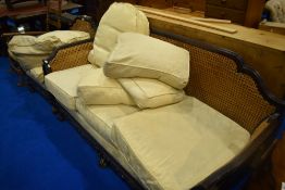 A two piece bergere cane lounge suite