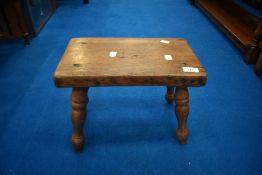 A rustic stool, approx 35 x 22cm