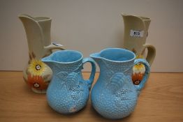 Two pairs of mid-20th Century jugs by Wade and Brentleigh Ware, the largest measuring 21cm tall