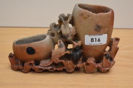 A Chinese carved soapstone bud vase.
