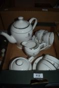An eleven piece Queen Elizabeth commemorative tea service.