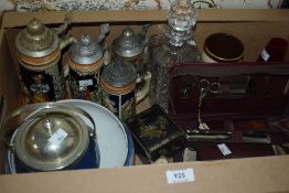 Four vintage stone beer steins, a Wedgwood dark blue Jasperware biscuit barrel, a Royal Albert