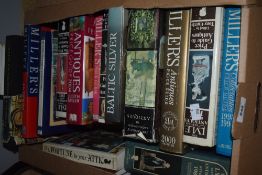 A carton of antique themed books with titles such as Miller's Collectables, A Fortune in your Attic,