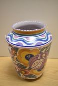 An Art Deco Poole pottery vase with painted and impressed marks to the base, measuring 25cm tall