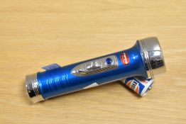 A vintage Pifco torch and battery, 15cm long
