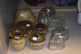 A collection of Tregaron Pottery stoneware jars, jar names translate to; cheese, sugar, milk,