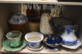 A Chinese blue, white and gilt lidded jar and a ginger jar void of lid.