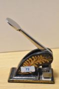 A Victorian black lacquered paper stamp press, '33 Jesmond Park West, Newcastle Upon Tyne, NE7 7EU',