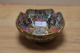 A 1920s Chinese Famille rose porcelain medallion bowl, having cut corners, gilt heightening and