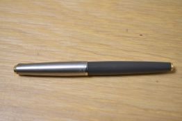 A Parker 61 fountain pen in navy grey with lustalloy cap.