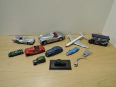 A selection of mixed vintage playworn die-casts including early Dinky Cornwall Van, Corgi Bluebird