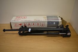A boxed Orion tripod
