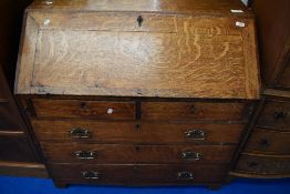 An 18th Century and later golden oak bureau , dimensions approx W99 H97 D50cm