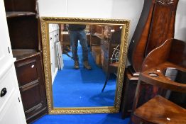 A large modern gilt frame wall mirror , approx 89 x 114cm