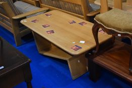 A modern light wood coffee table, of similar design to lots 629 & 630, approx. 129 x 70cm