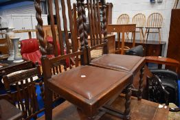 A set of four early 20th Century wave back dining chairs
