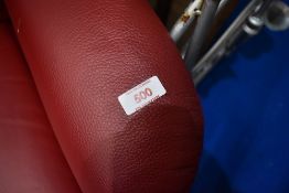 A modern read leather rechargeable rise and recliner chair