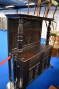 A period oak court cupboard having carved panels , dimensions approx. W133cm D53cm H160cm