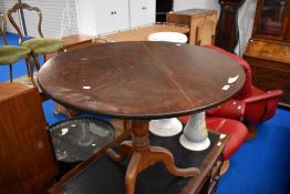 A 19th Century mahogany circular top pedestal table on turned column and triple splay legs, diameter