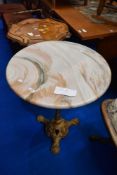 A marble top occasional table having heavy cast frame with gilt finish, diameter approx 60cm, height