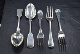 Two William IV silver Hanoverian pattern dessert forks, engraved with lion passant crest to reverse,