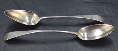 Two George III provincial silver Old English pattern table spoons, slight difference in size, 23cm x