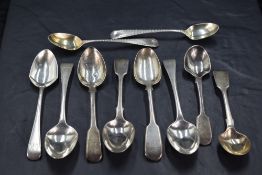 A group of mixed George III and Victorian silver spoons, various designs, ages and makers, gross