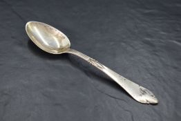 An attractive Danish silver spoon, the planished and foliate moulded stem with trefoil terminal,