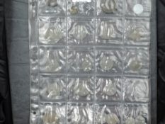 A collection of mainly Tokens on four coin sheets, approx 80 in total including 1838 One Stiver,