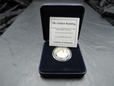 A Westminster Mint Turks and Caicos Islands 1997 Queen Elizabeth II Gold Proof 14ct 1/4oz Coin, in