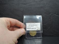 A 1791 George III GB Gold Guinea in NGS plastic wallet, Altered Surface