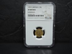A 1797 George III GB Gold Third Guinea in NGS plastic capsule, Damaged